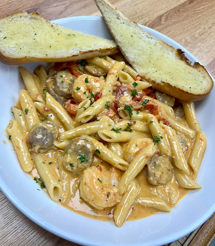 Creamy Cajun Shrimp Pasta from Carriage Towne, the best dinner destination in Kingston, New Hampshire.