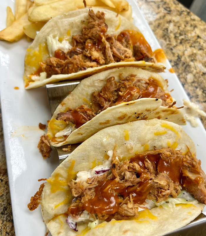 Shredded pork and brisket tacos from Carriage Towne, the best lunch spot in Kingston, New Hampshire.
