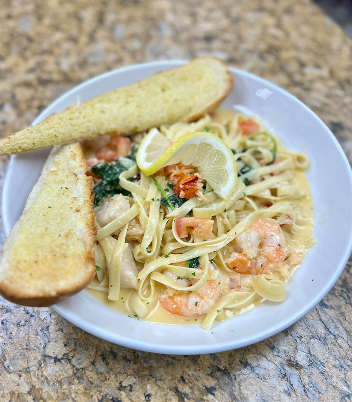 Shrimp Alfredo from Carriage Towne, the best dinner destination in Kingston, New Hampshire.